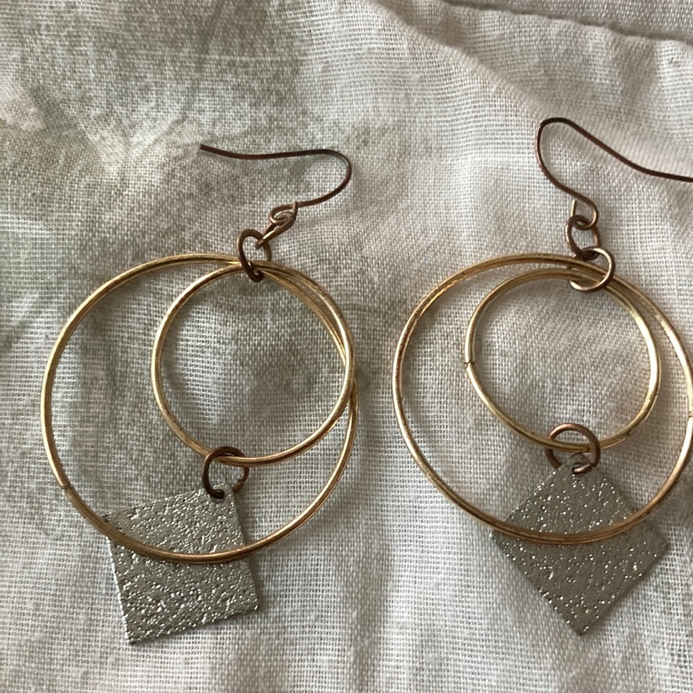 Goldstone earrings with dangling sparkles at the bottom
